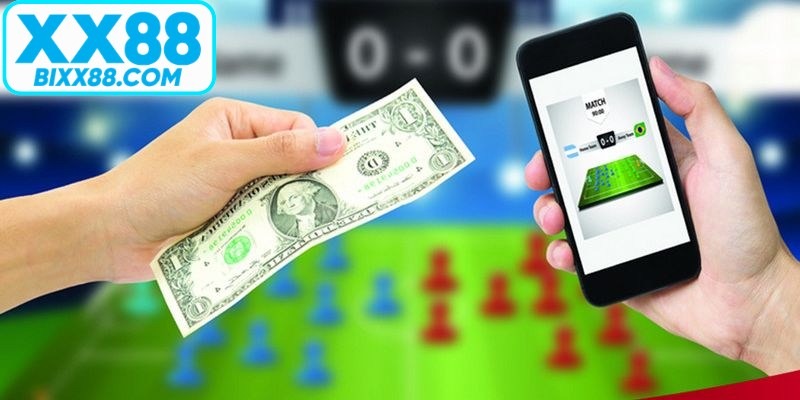 Người chơi phân tích biểu đồ tài chính trước khi xuống tiền cược